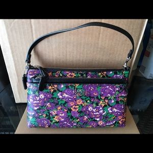 Never used Coach wristlet with pop out pouch